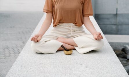 https://www.pexels.com/photo/a-woman-meditating-with-a-singing-bowl-9031632/